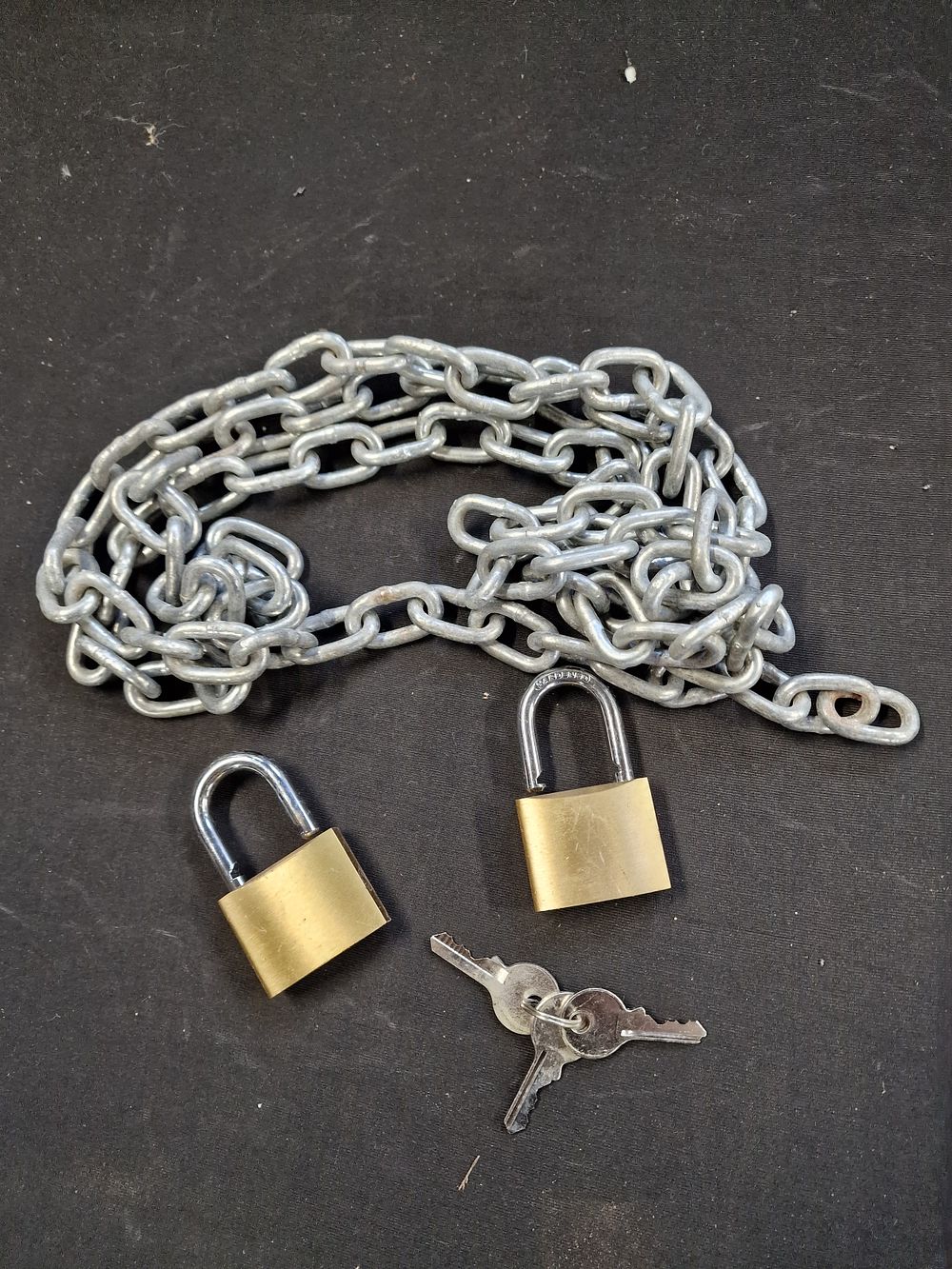 Lot 551: Padlocks and Chain