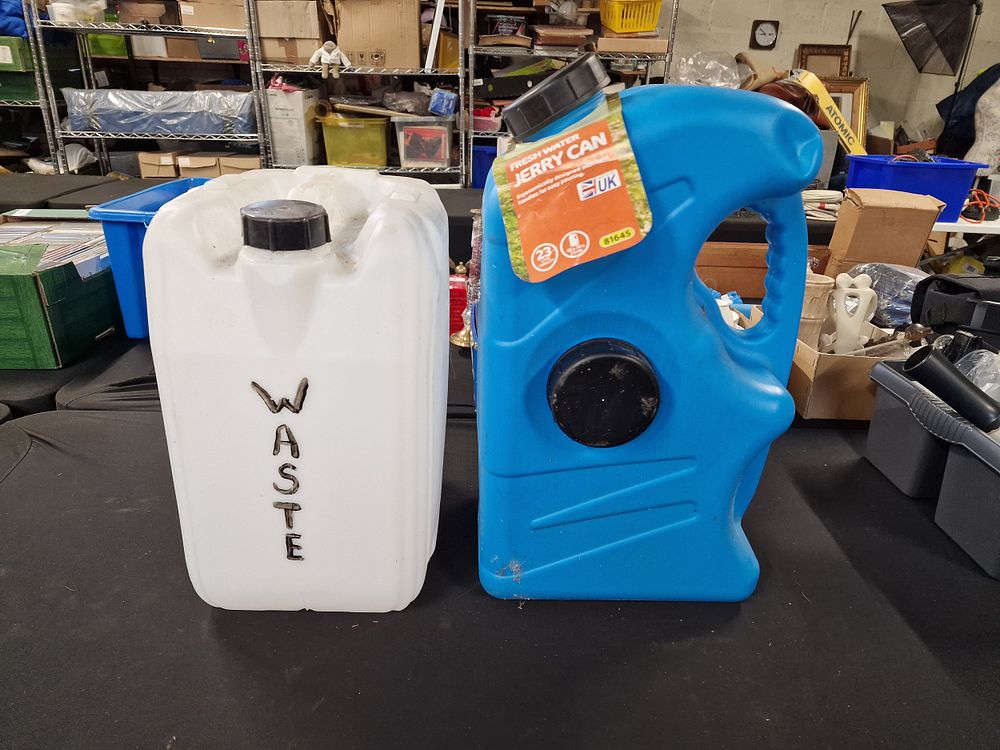 Lot 553: Camping Water Tubs