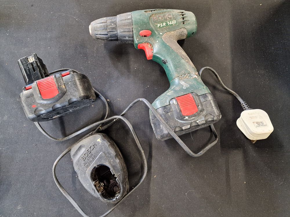 Lot 563: Bosch PSR1440 14.4v Drill Driver, Batteries and Charger...