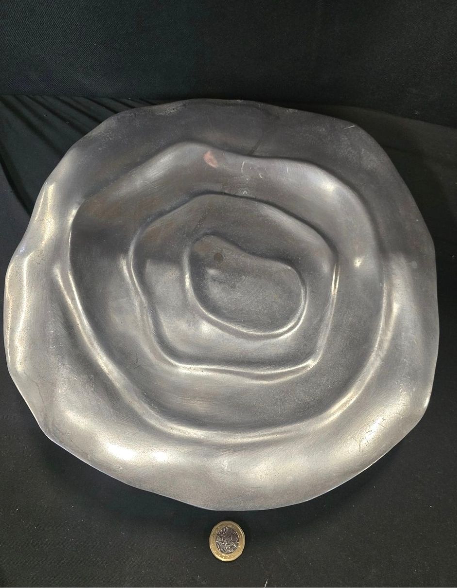 Lot 596: An unusual Indonesian made white metal plater dish