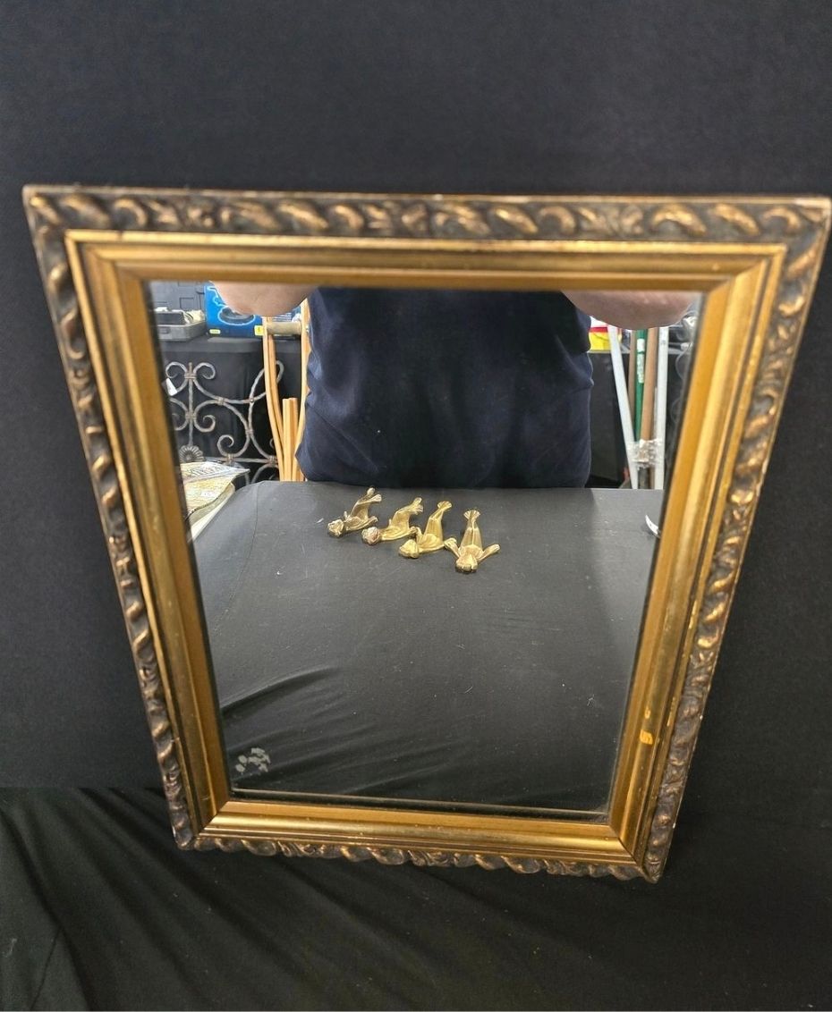 Lot 600: A heavy wood mirror 29x38cm approx