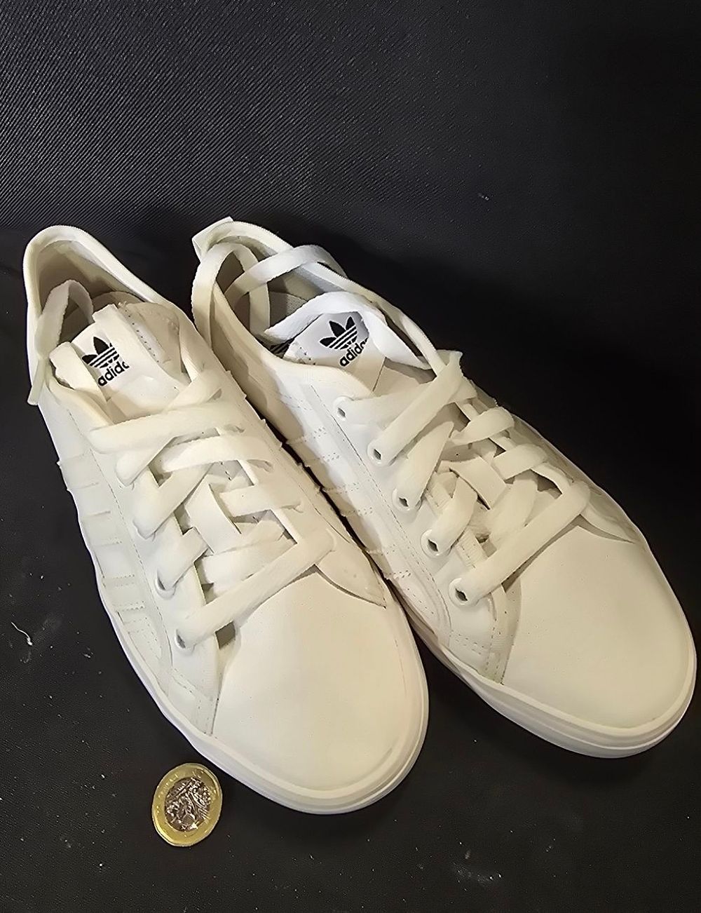 Lot 601: A pair of like new white Adidas Nizza...