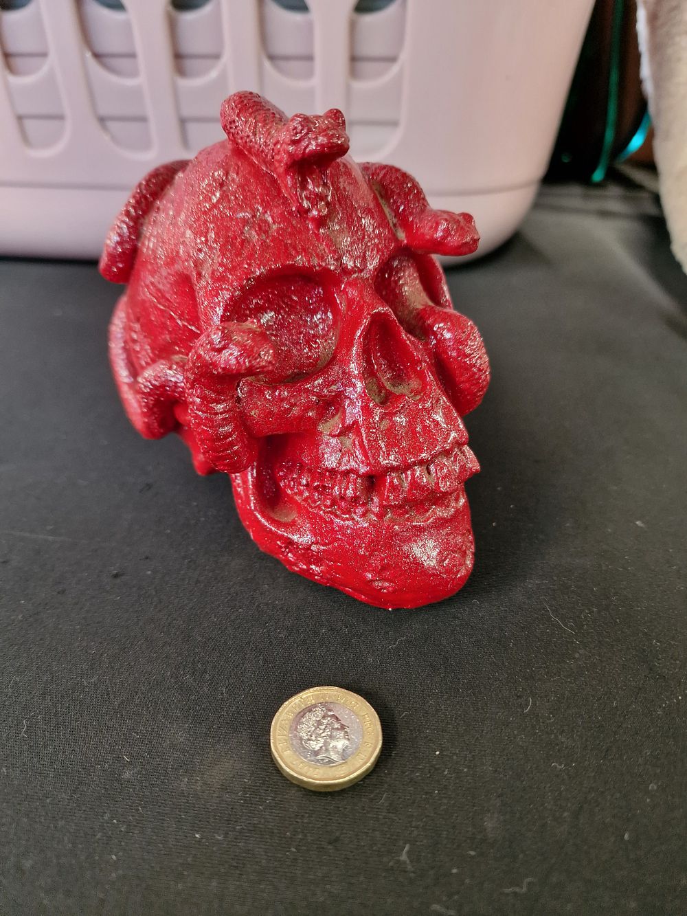 Lot 657: Decorative Skull and Snakes