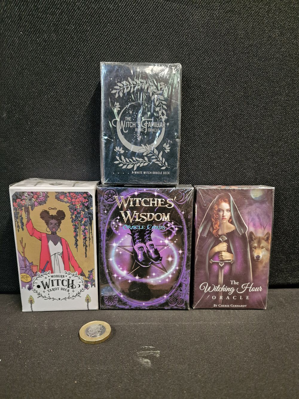 Lot 560: Four Packs ot Tarot Cards