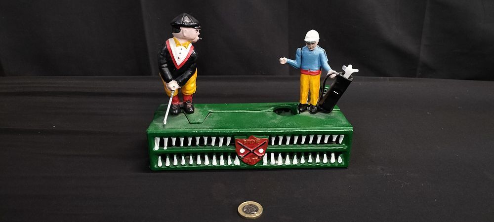 Lot 563: Vintage Cast Metal Money Box with Golfers. Measures...