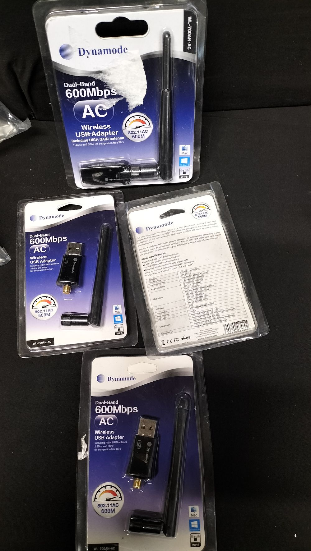 Lot 569: Four Customer Returns Dynamode Dual Band 600 Mbps...