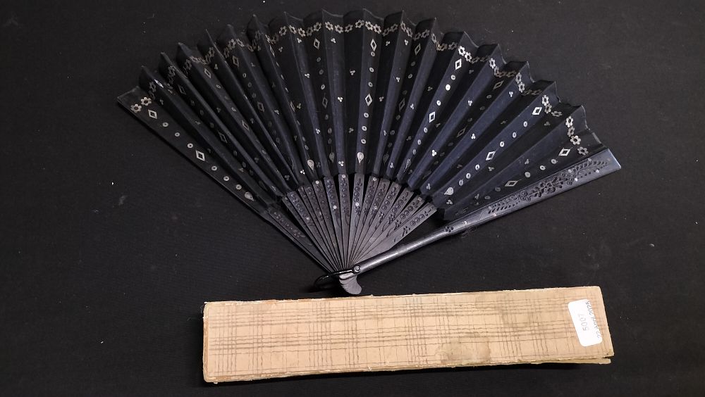 Lot 611: Boxed Wooden Black and Silver Patterned Fan