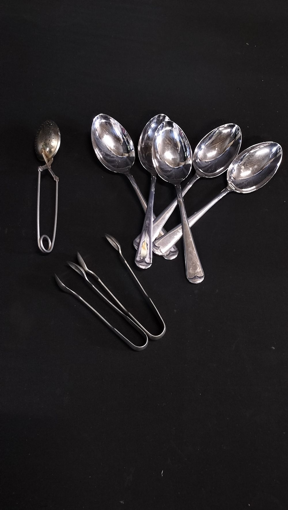 Lot 617: Two Silver Plated Sugar Tongs, 5 Spoons and...