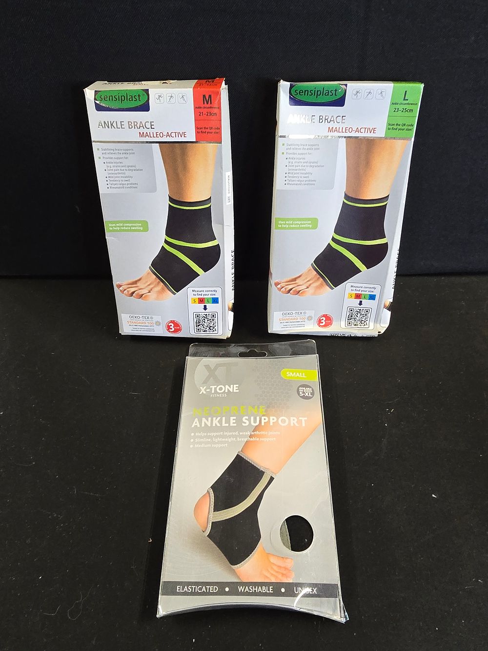 Lot 644: Small, medium and Large Ankle braces all new