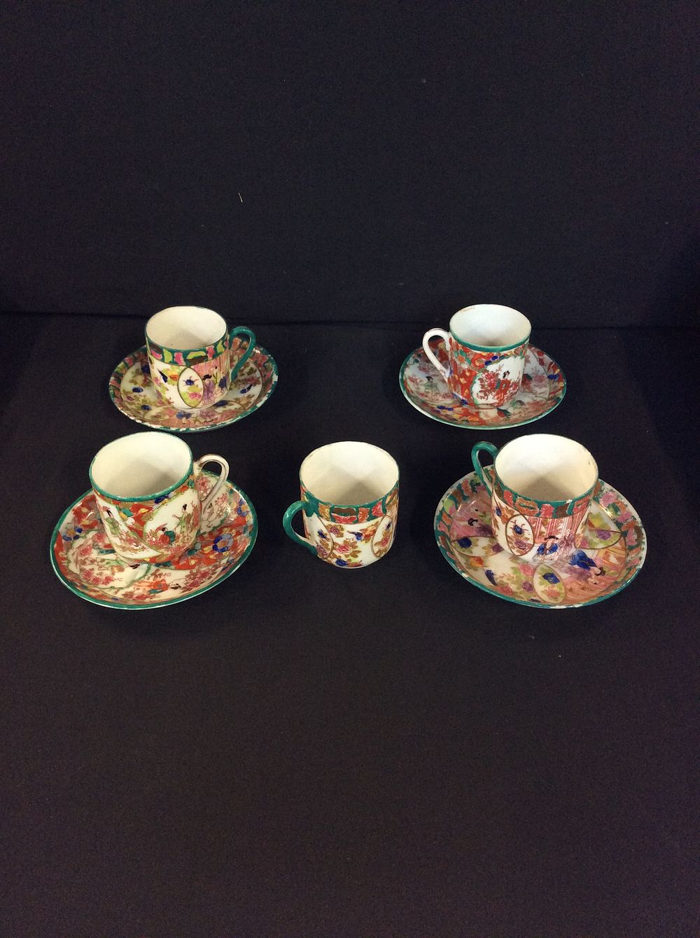 Lot 652: 4 Oriental Style Cups and Saucers and One...