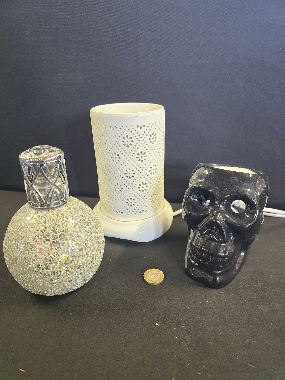 Lot 658: Three oil and wax burners.