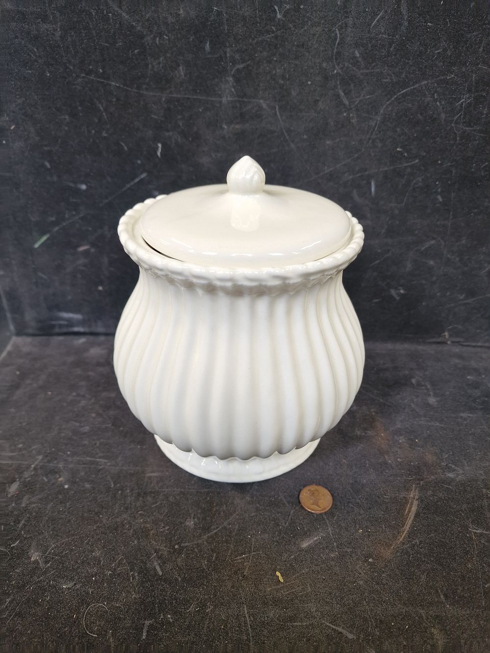 Lot 664: Large Cream Pot Bellied Rippled Ceramic Cookie or...