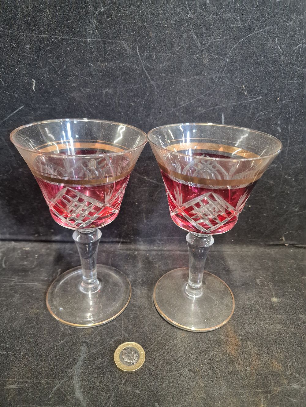 Lot 678: Pair of Vintage Bohemian cranberry lustre port glasses