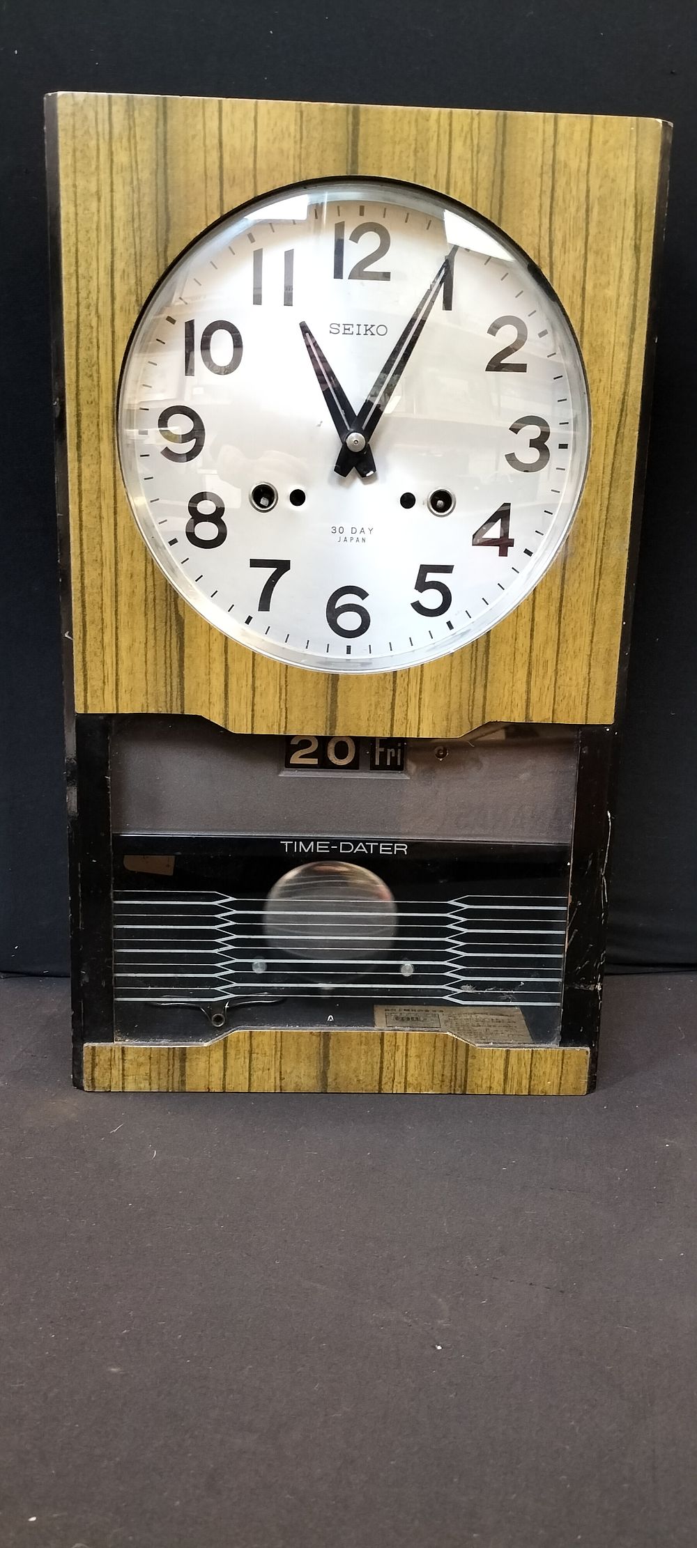 Lot 152: Wood and Glass Fronted Seiko 30 Day Time-Dater...
