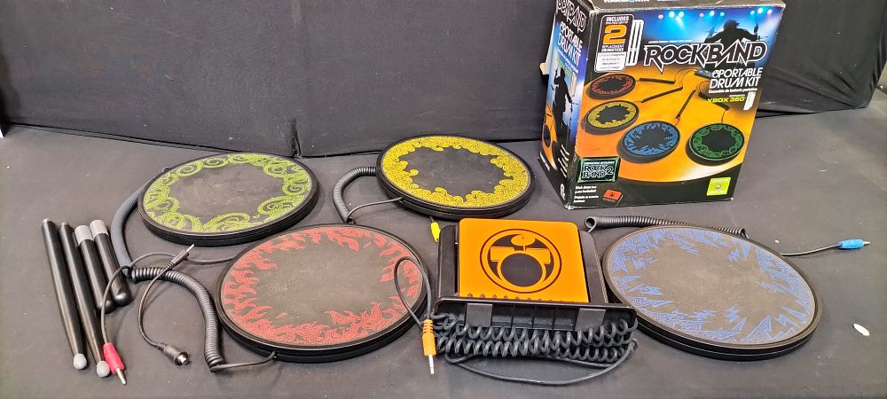 Lot 161: X-Box 360 Rockband Portable Drum Kit. Compatible with...