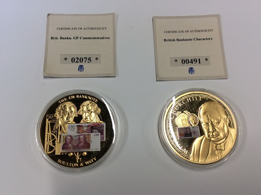 Lot 186: Two Gold Plated 50mm Coins. £5 Note Winston...