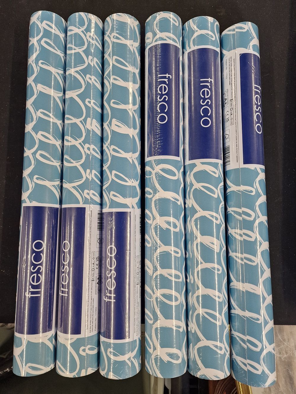 Lot 744: x6 Rolls of Fresco Wallpaper Pattern 117902 Sea Swirls Blue. Approx 5.2m Sq per Roll