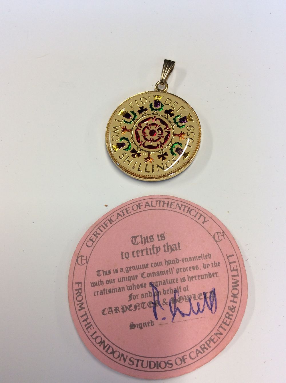 Lot 202: Enamelled 1959 Two Shilling Coin on a pendant...
