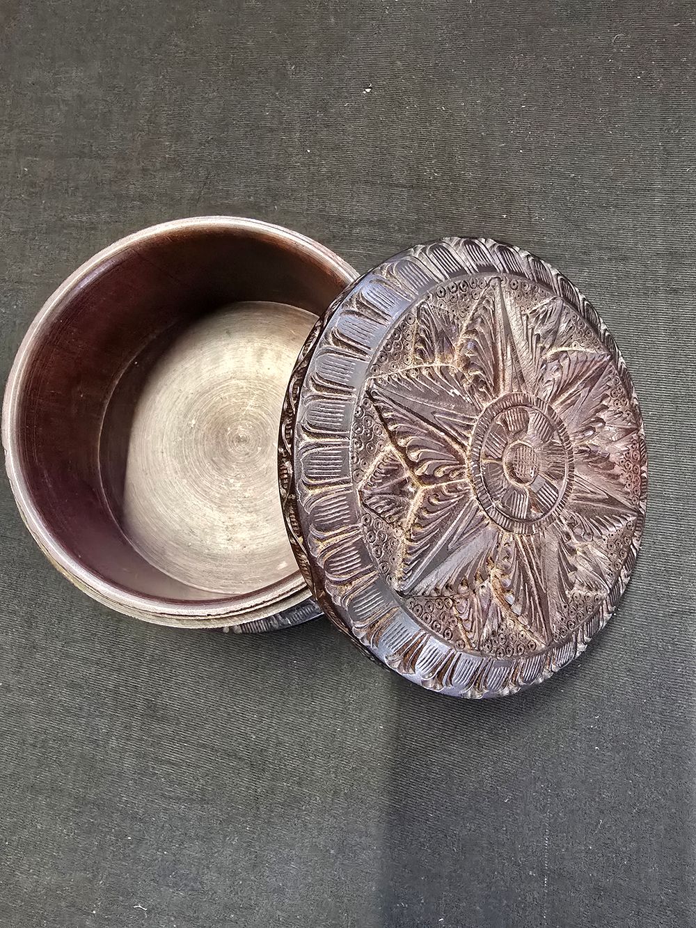 Lot 780: Beautifully hand carved wooden screw top box  with lion chasing a gazelle