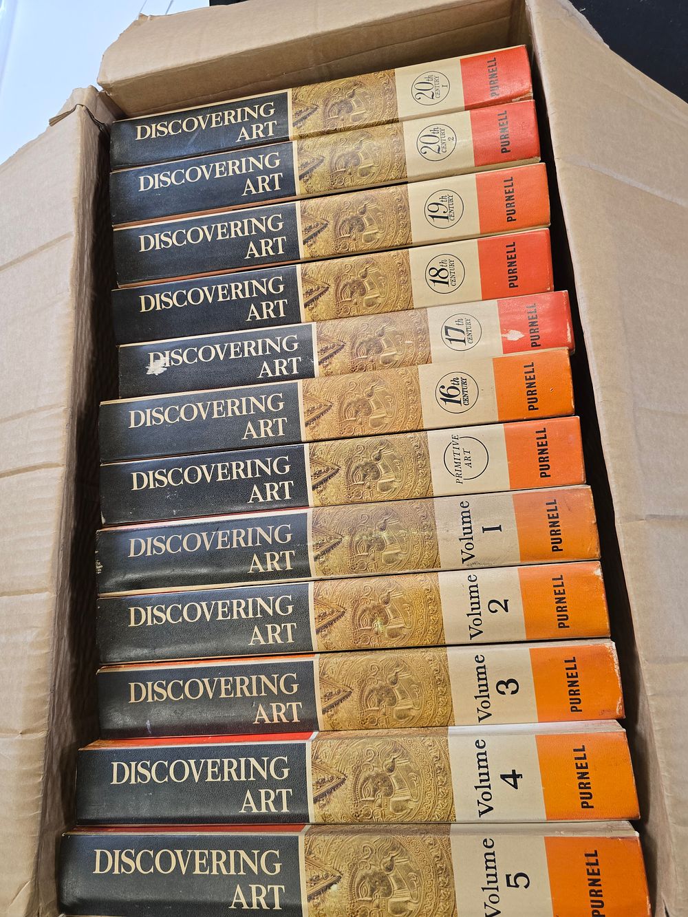 Lot 250: 12 volumes of Discovering Art.  Primitive Art through to 20th Century Art . Collection only