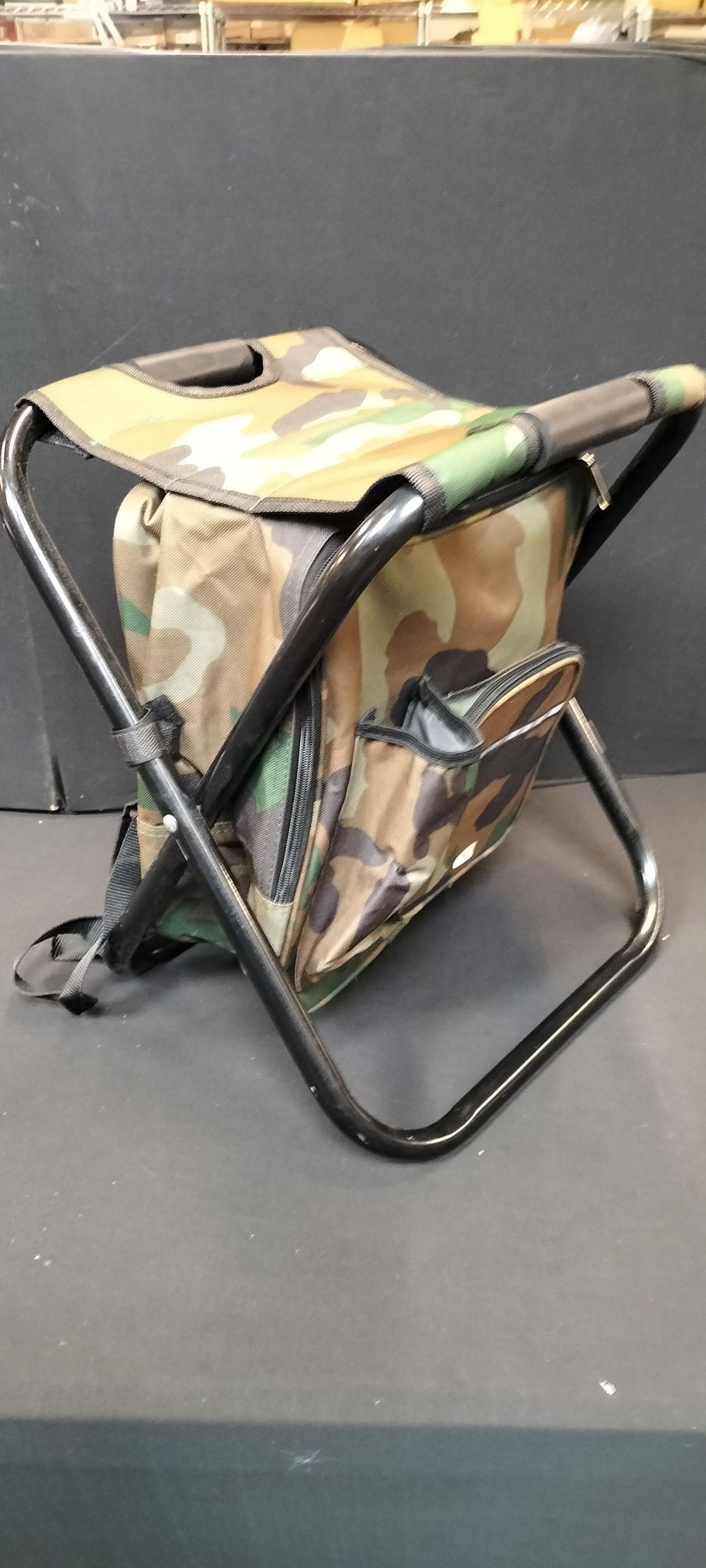 Lot 242: Folding Camouflage Stool with Attached Backpack