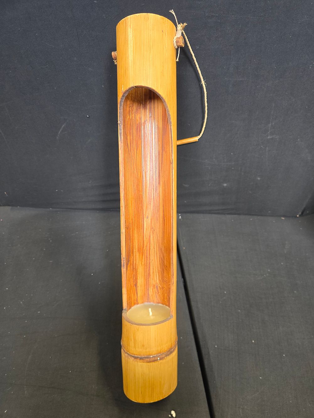 Lot 297: Outdoor bamboo candle holder 24" long