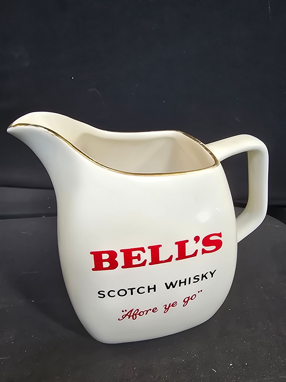 Lot 588: BELLS Scotch whiskey intage water jug