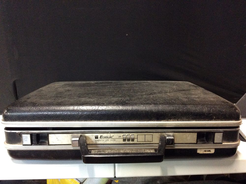 Lot 592: Echo lac Combination Briefcase. (No combination)
