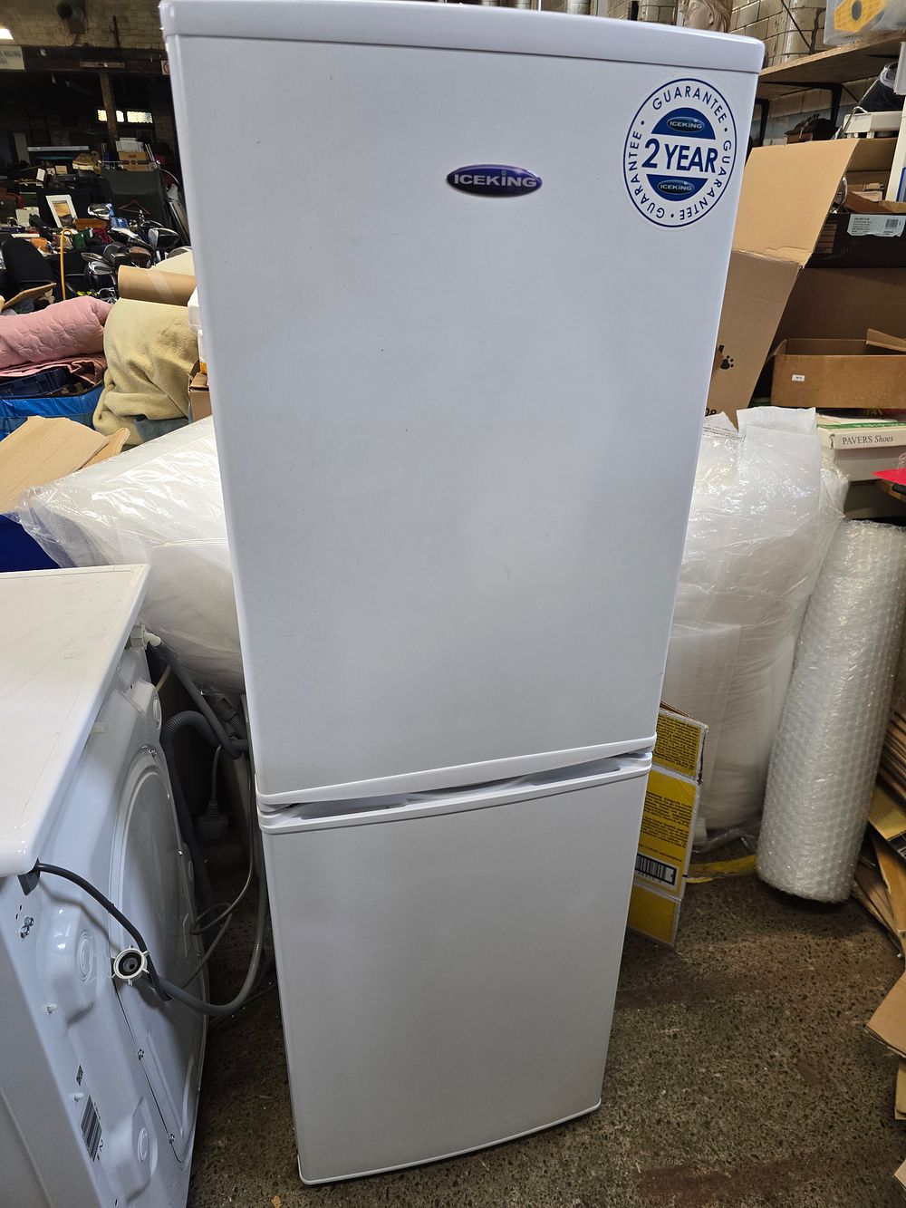 Lot 693: Slimline IceKing fridge freezer