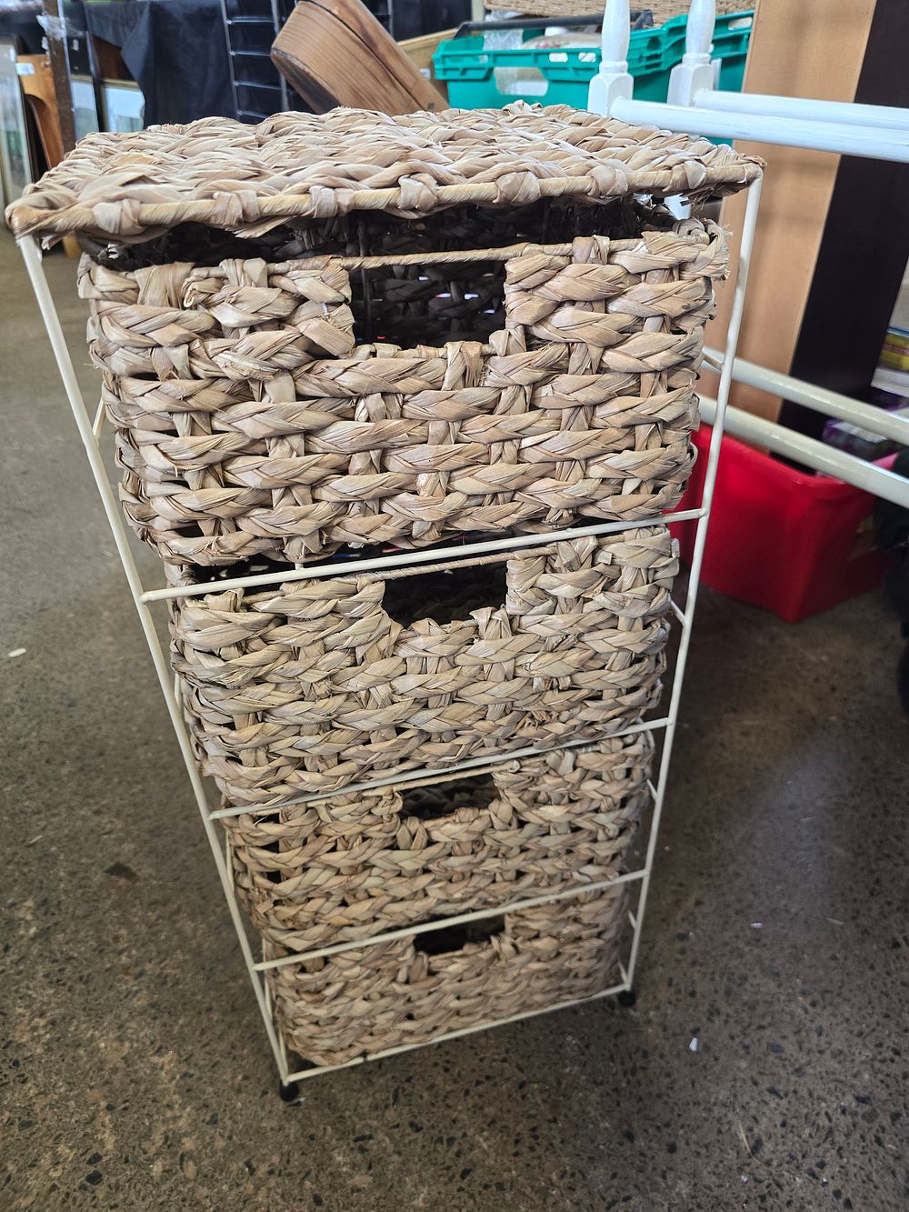 Lot 699: Four basket storage unit.