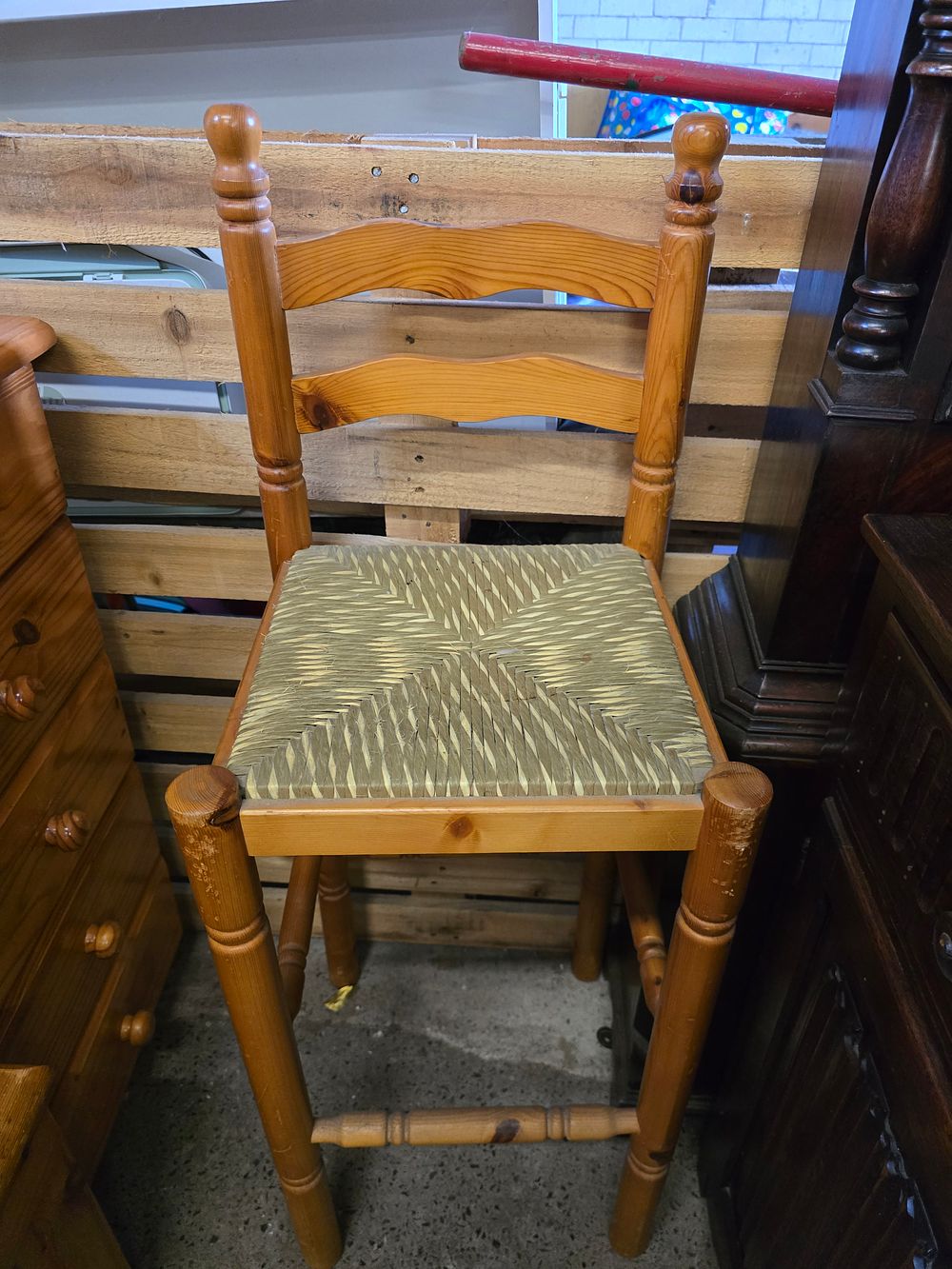 Lot 713: Pine and wicker bar stool