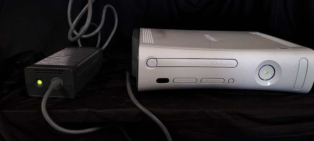 Lot 763: Boxed 2009 Microsoft XBOX 360 60Gb HDD hard...