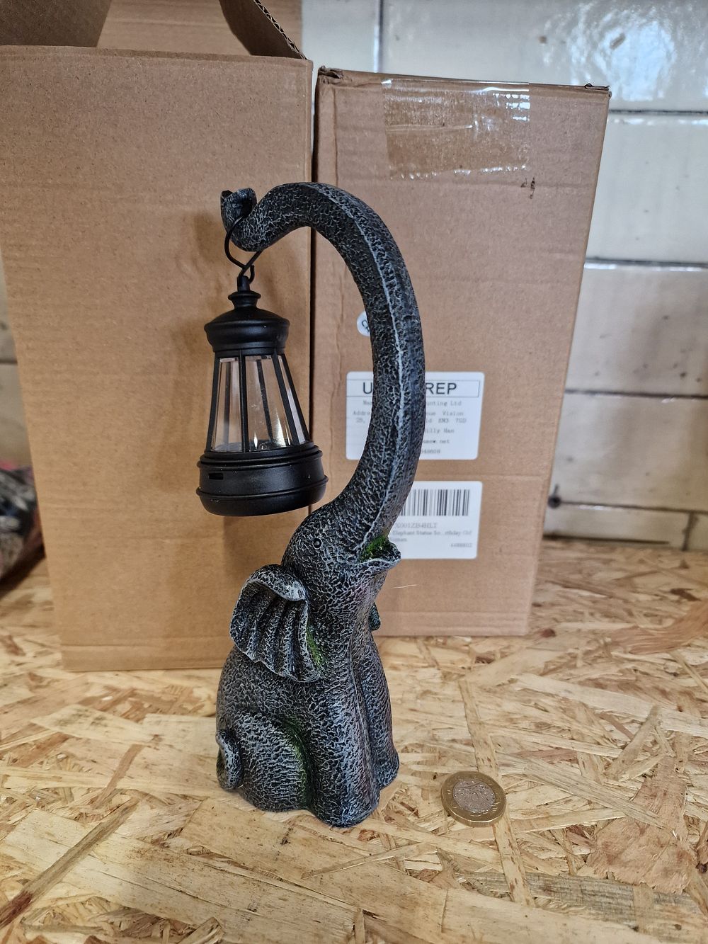 Lot 795: Two brand new solar elephant ornaments
