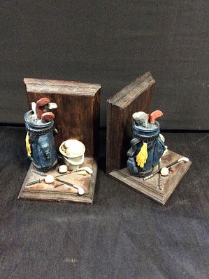 Vintage golf theme bookends. Hand painted
10cm wide 9cm deep 12cm height,
Right hand one has a