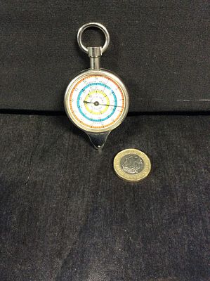 Vintage map Opisometer. This object is used as a map measurer.
The device measures the curved