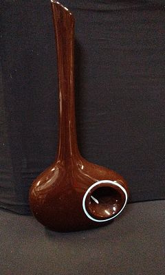 Brown Art Pottery Stem Vase with Pale Blue Accents. Measures Approx H5 x W25.5 x D9.5 cm