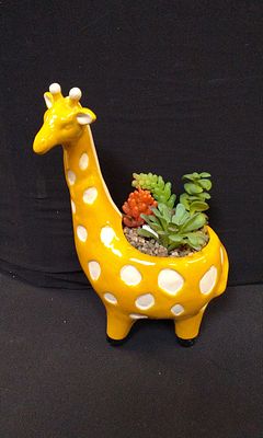 Giraffe Planter with Faux Succulent Plants. Measures Approx H128. 5 x W20. 5 x D 11. 5 cm