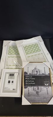 Set of 4 photo frames. All new