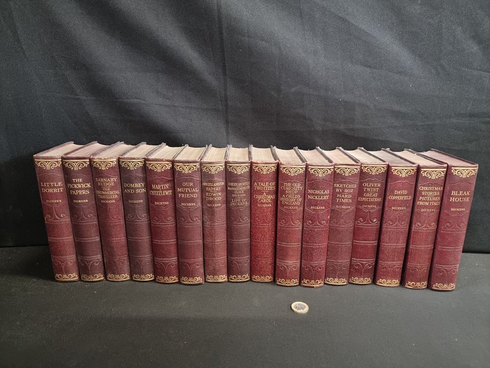 Lot 155: A collection of 16 + 1 hard back books by Charles Dickens published by Hazell , Watson & Viney ltd