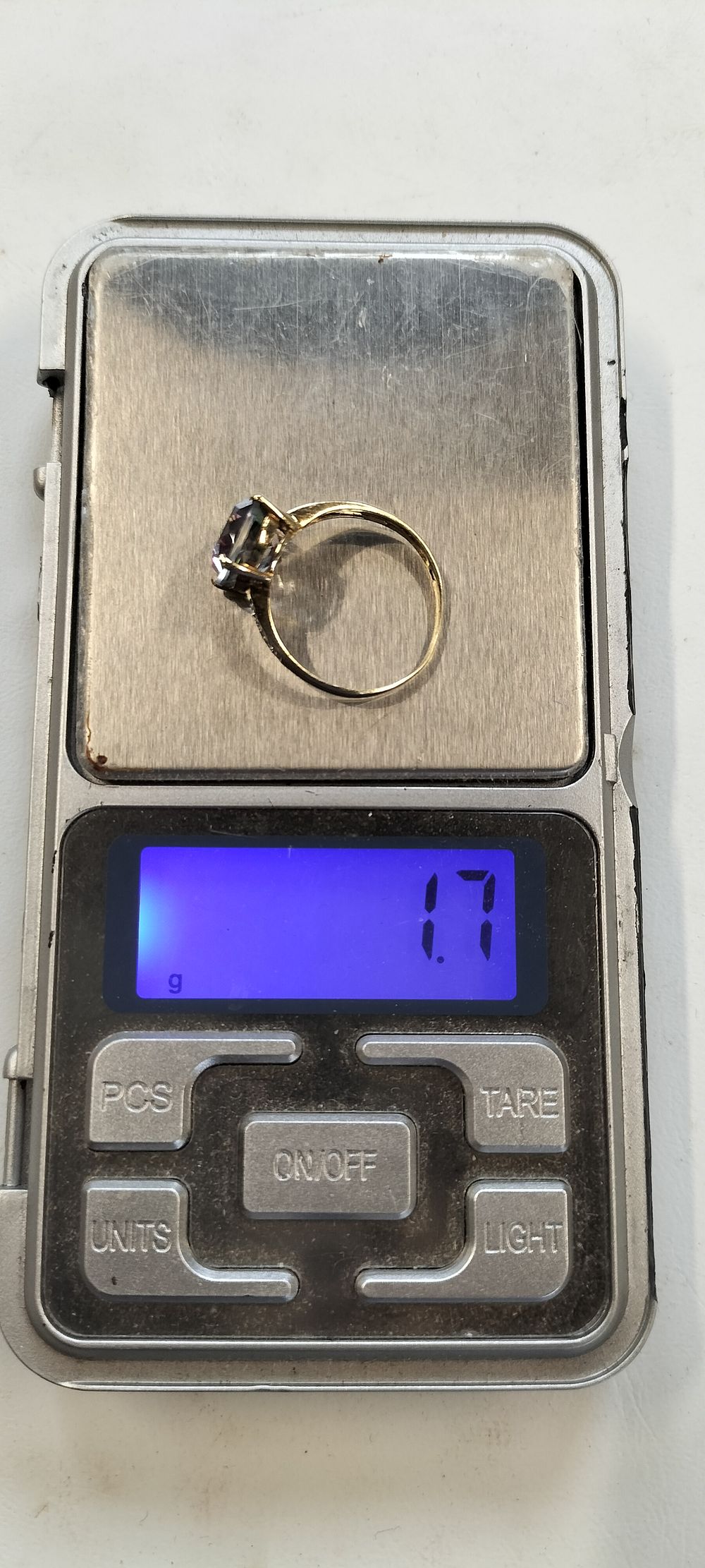 Lot 254: 9ct Gold Ring with Rainbow Topaz Stone and diamond set shoulders Size