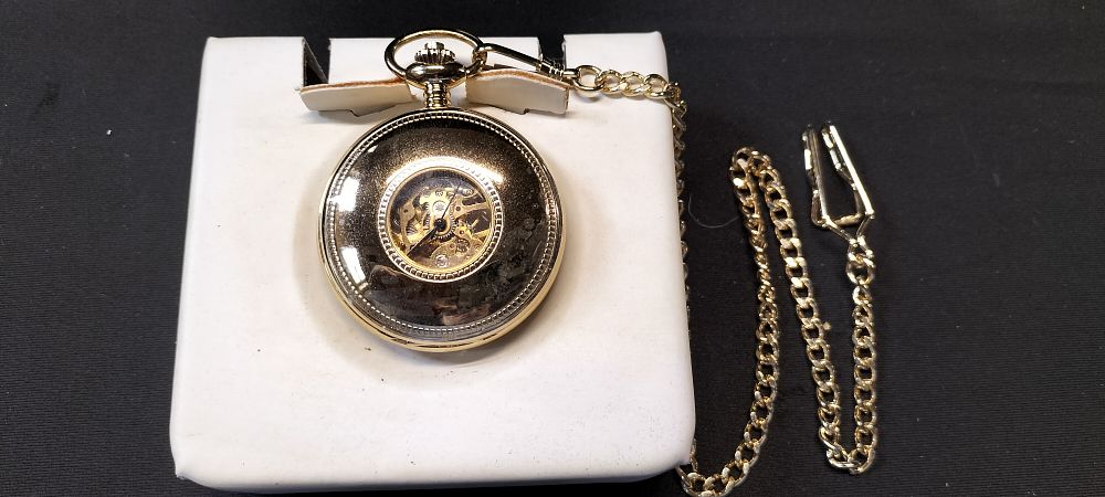 Lot 256: Rotary Stainless Steel Gold Coloured Mechanical Pocket Watch with Skeleton Movement