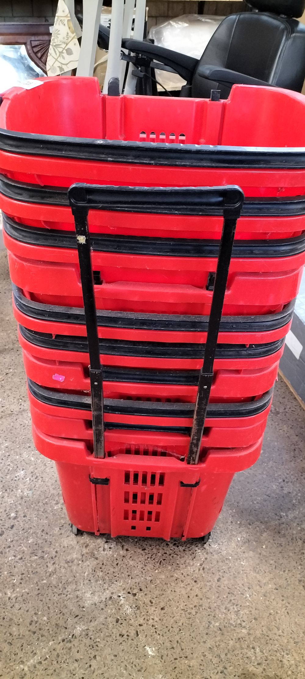 Lot 276: 10 Stacking Shopping Baskets with wheels