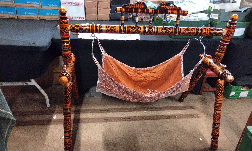 Lot 403: Gold and Black Indian Ghodiyu Hammock Crib with 2 Material Hammocks