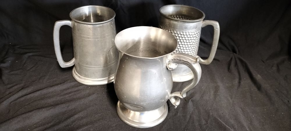 Lot 420: Three Pewter Tankards
