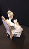 A large Lladro Figurine of Mother Reading. Measures Approx 25.5 x 12.5 x 23 cmImage - 1