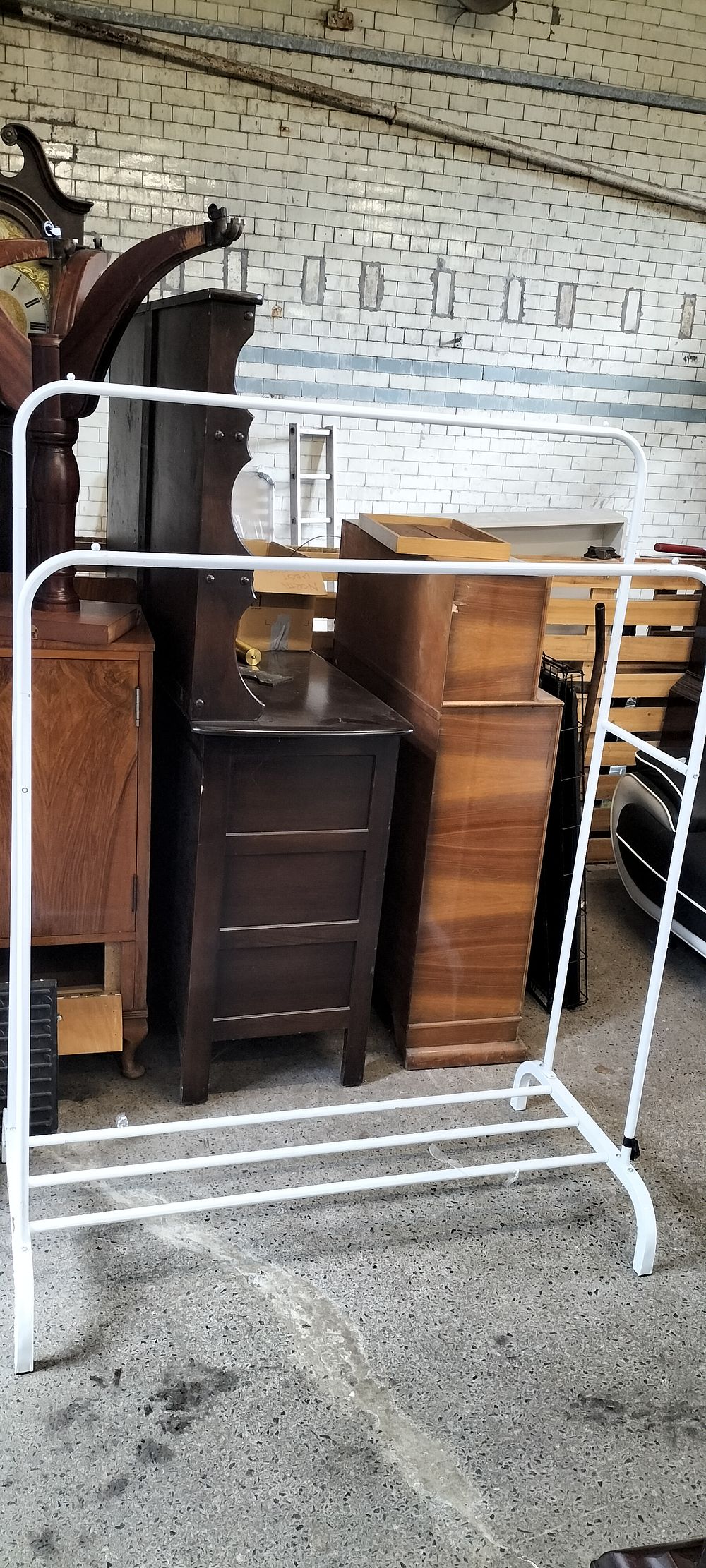 Lot 165: Two Bar Metal Clothes Stand with Shoe Storage on the Base