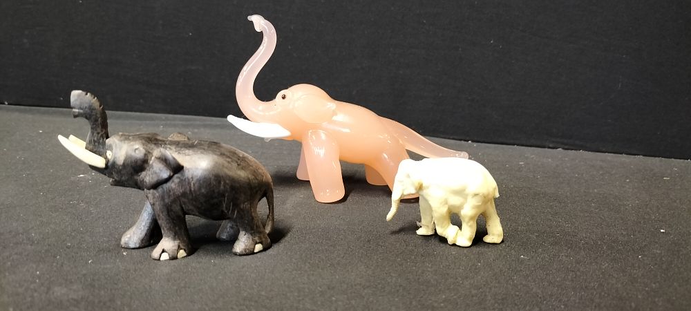 Lot 169: Three Elephants, One Vintage Blown Art Glass Peach, One Vintage Hand Carved Wood and One Plastic