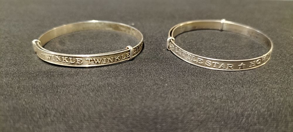 Lot 179: Pair of Baby or Christening Bracelets White Metal