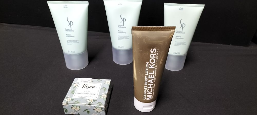Lot 194: Three Wella System Professional Anti Dandruff Shampoo, a Michael Kors Body Lotion and a Krizma Jasmine Shampoo Soap