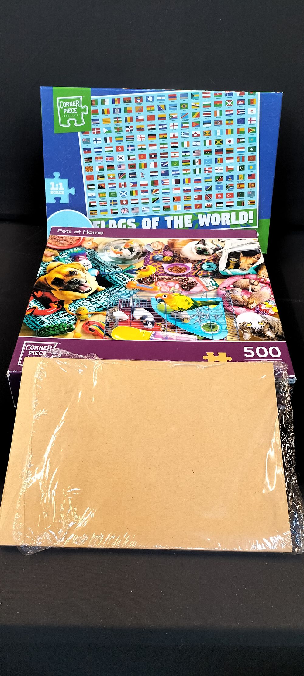 Lot 699: 2 Jigsaw Puzzles and some Brown A5 Envelopes